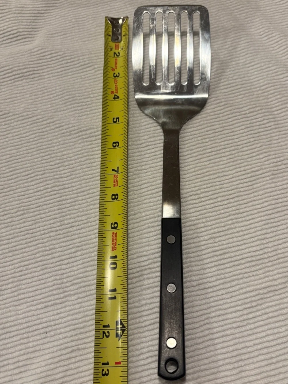 Martha Stewart Stainless Steel Slotted Spatula with Black Handle